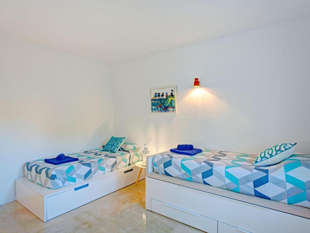 Postel nebo postele na pokoji v ubytování Villa Villa Terrace sur Mer by Interhome
