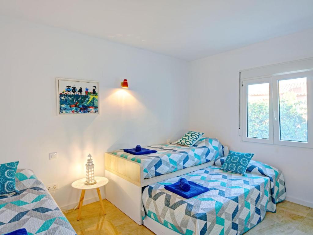 Postel nebo postele na pokoji v ubytování Villa Villa Terrace sur Mer by Interhome