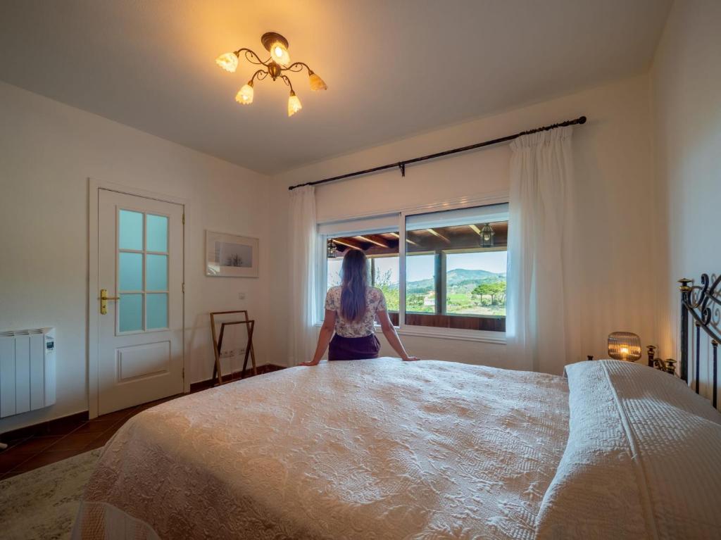 Postel nebo postele na pokoji v ubytování Ecofinca Selva Doramas
