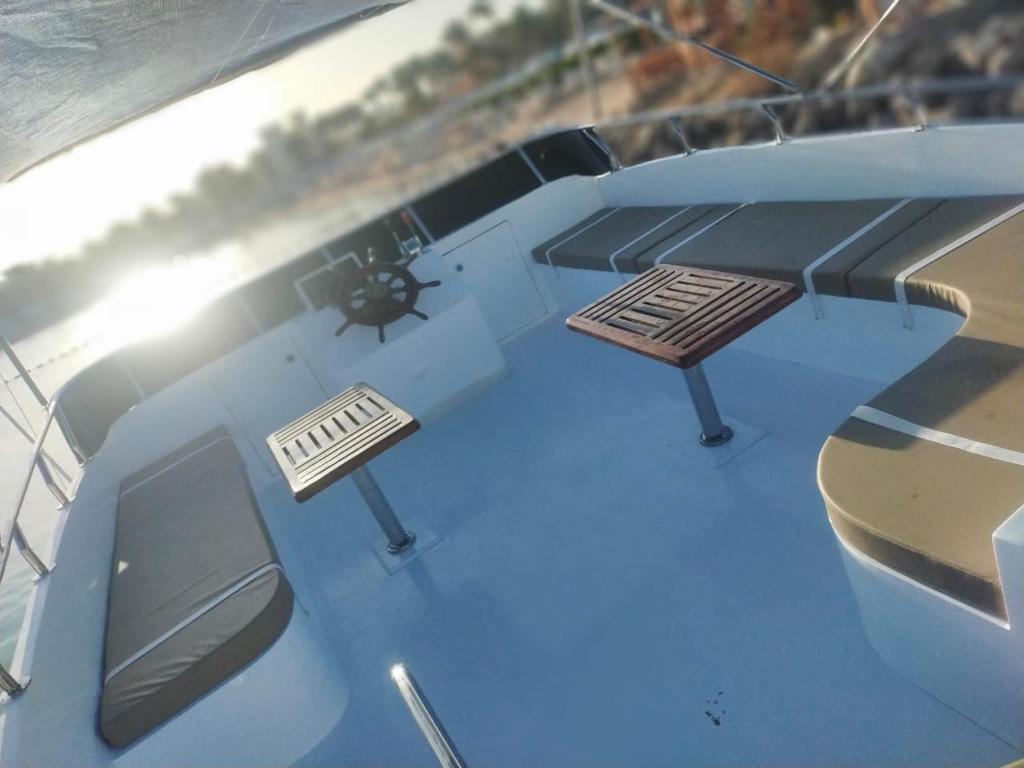 a view of two benches on the top of a boat at tiger in Hurghada