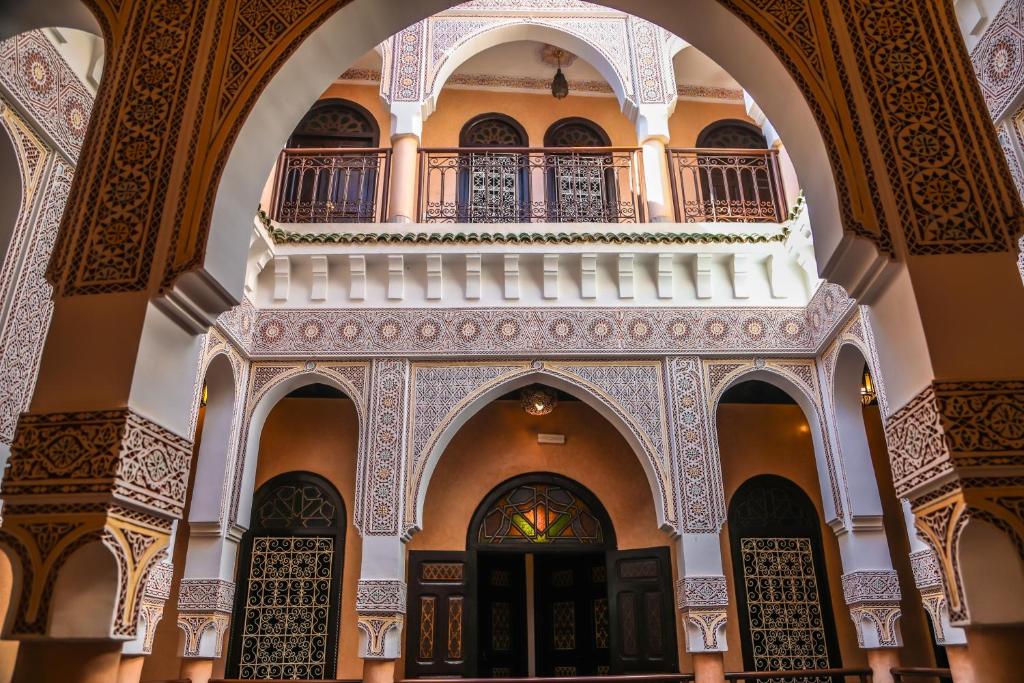 a view of the mosque from inside the building at Riad Hôtel Marraplace in Marrakesh
