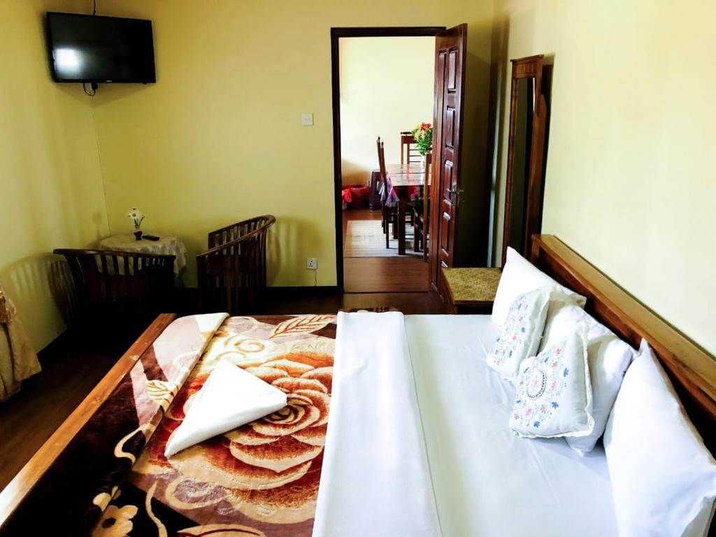 Letto o letti in una camera di Shevyhaws