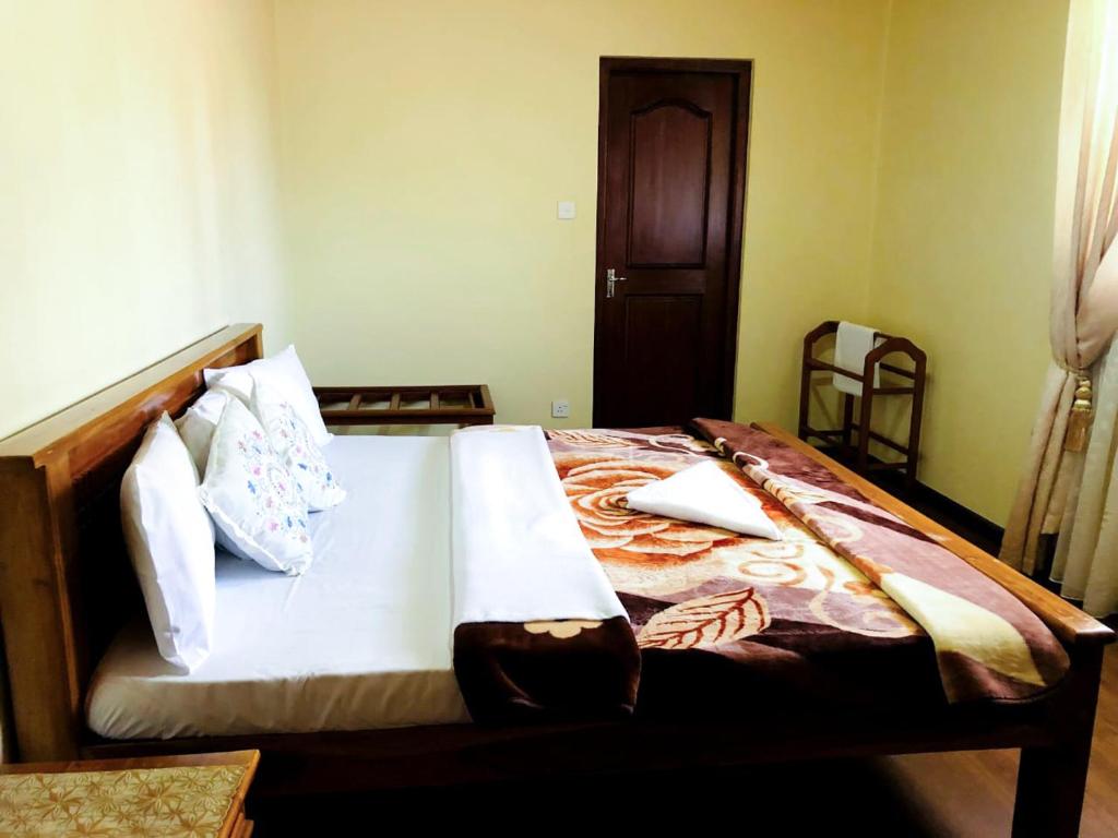 Letto o letti in una camera di Shevyhaws