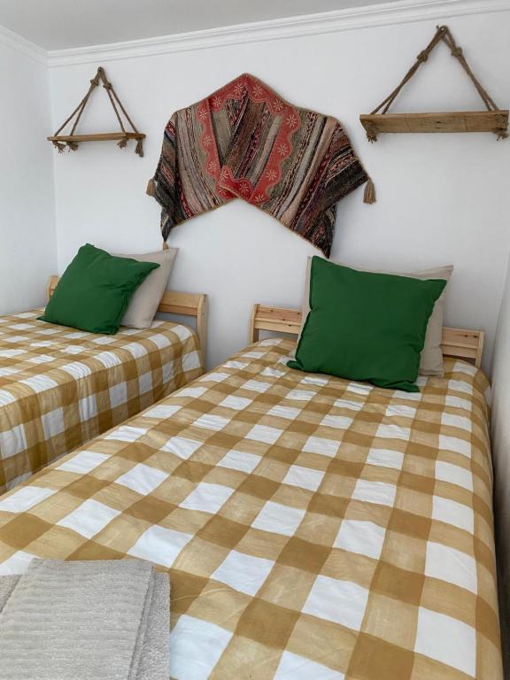 Un pat sau paturi într-o cameră la VISIT MOURA - Retiro da Mouraria