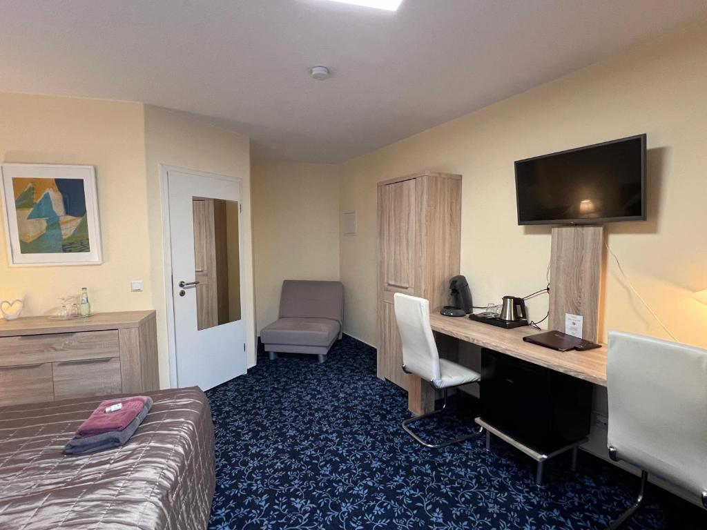 TV a/nebo společenská místnost v ubytování Hotel Sonnenhof