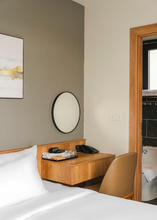 Postel nebo postele na pokoji v ubytování TTR Central Apart Hotel