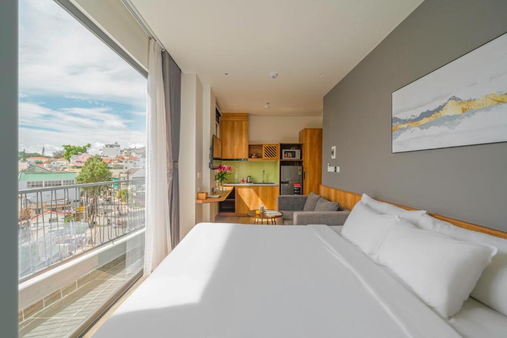 Postel nebo postele na pokoji v ubytování TTR Central Apart Hotel