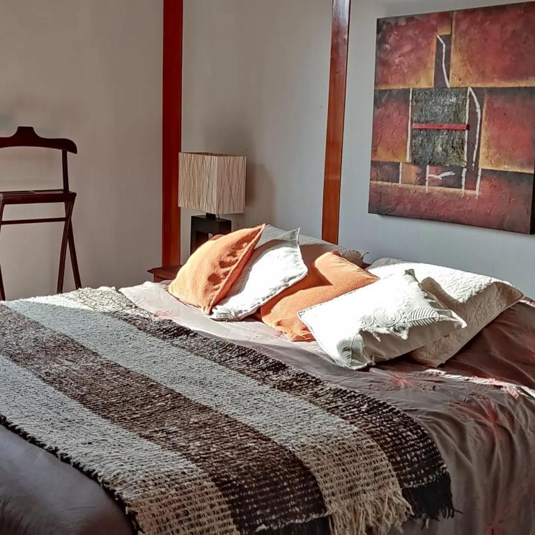 Postel nebo postele na pokoji v ubytování Refugio Los Cipreses Hotel