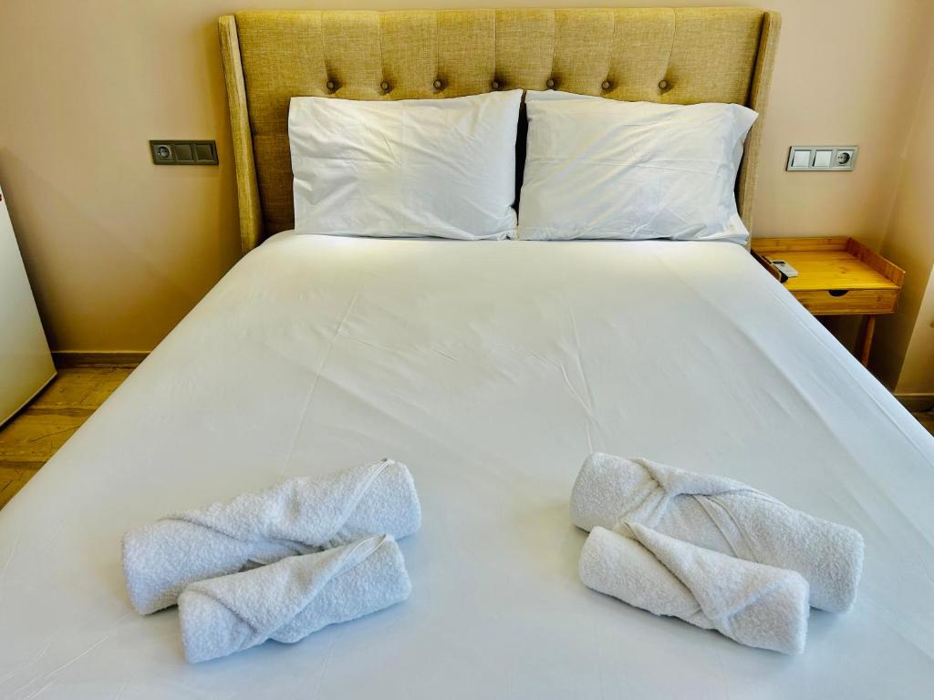 Postel nebo postele na pokoji v ubytování PORT TWINS SUITES No1