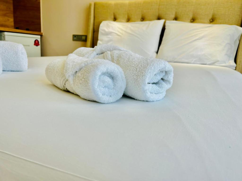 Postel nebo postele na pokoji v ubytování PORT TWINS SUITES No1