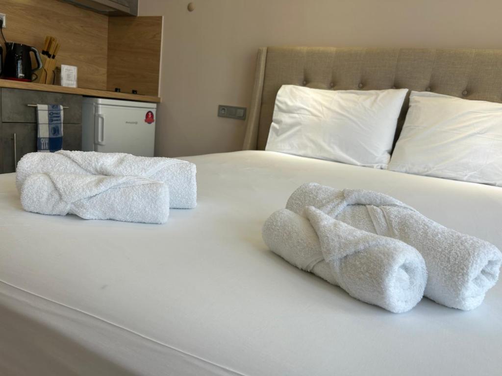 Postel nebo postele na pokoji v ubytování PORT TWINS SUITES No1