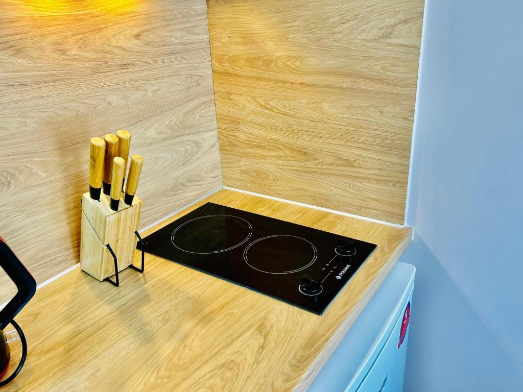 Kuchyň nebo kuchyňský kout v ubytování PORT TWINS SUITES No1