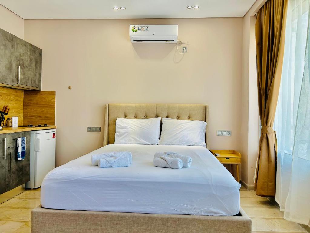 Postel nebo postele na pokoji v ubytování PORT TWINS SUITES No1