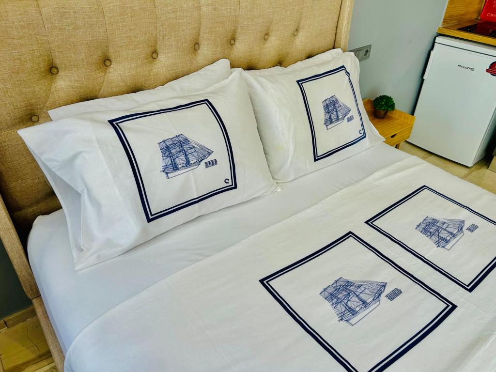 Postel nebo postele na pokoji v ubytování PORT TWINS SUITES No1