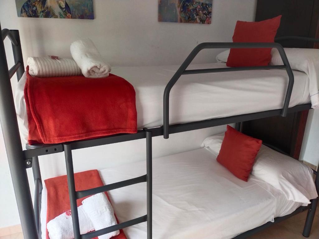 Łóżko lub łóżka w pokoju w obiekcie CENTRO ANTEQUERA Apartamento Calzada Centro