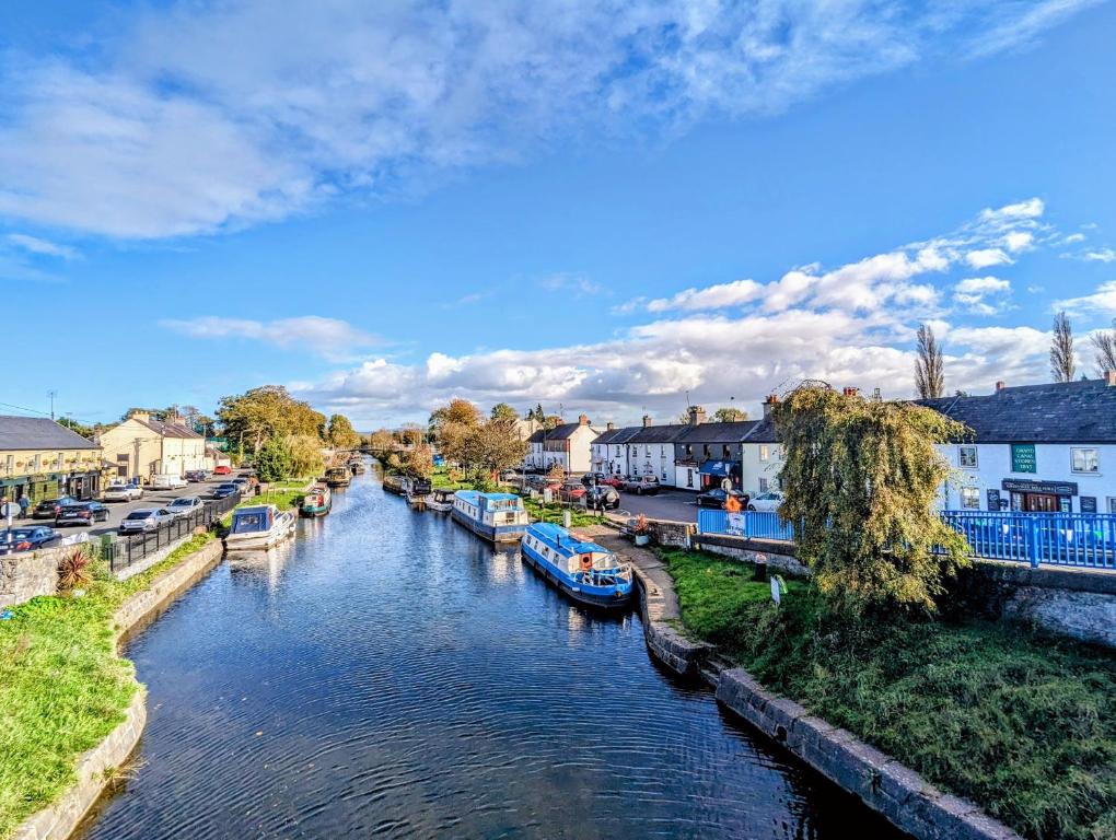 a view of a river with boats in a town at Sallins Loft in Sallins