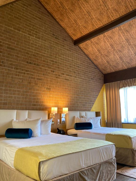 Postel nebo postele na pokoji v ubytování Split Rock Resort