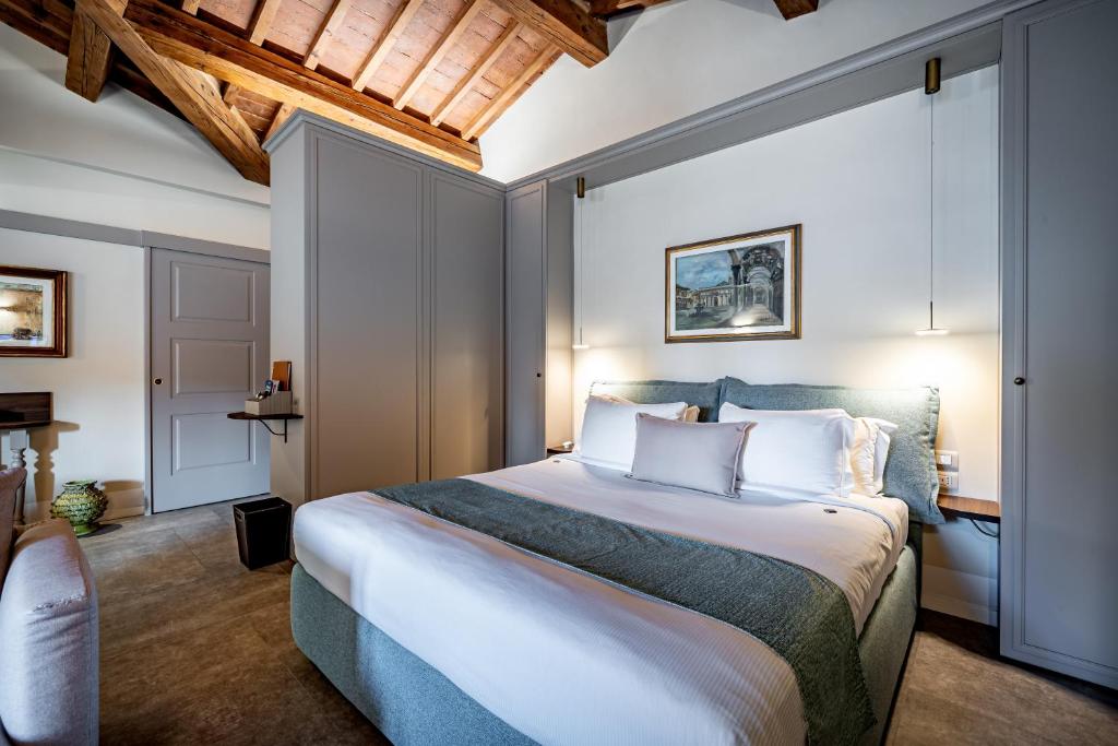 Voodi või voodid majutusasutuse Dimora Collection - Le Torri - Boutique Luxury Suites - Adults Only toas