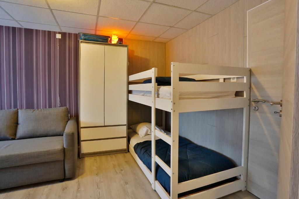 Palanda nebo palandy na pokoji v ubytování Chez Phil