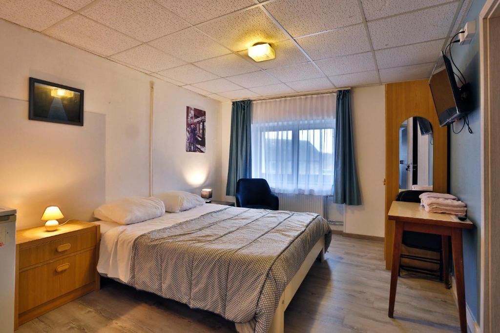 Postel nebo postele na pokoji v ubytování Chez Phil