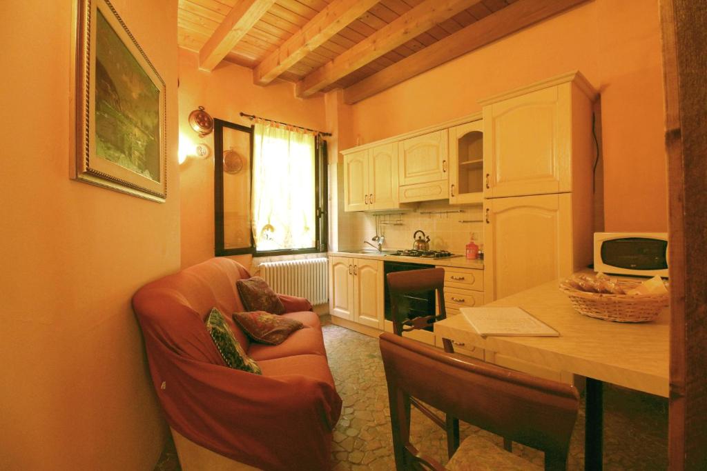 Kuchyň nebo kuchyňský kout v ubytování B&B Le Palme d'Oro
