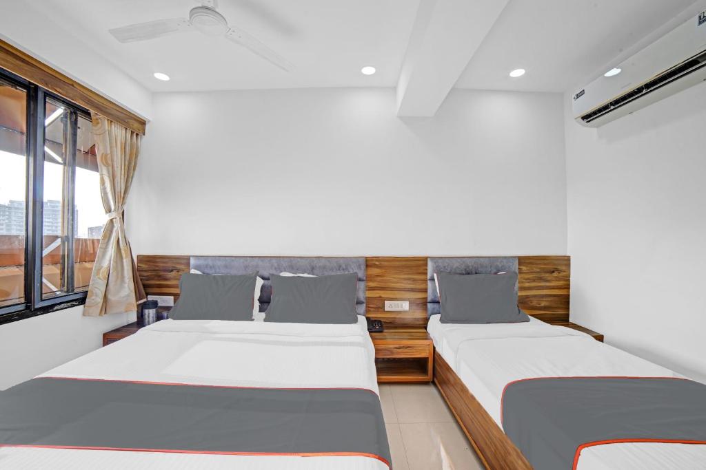 Postel nebo postele na pokoji v ubytování HOTEL TAPOVAN IN