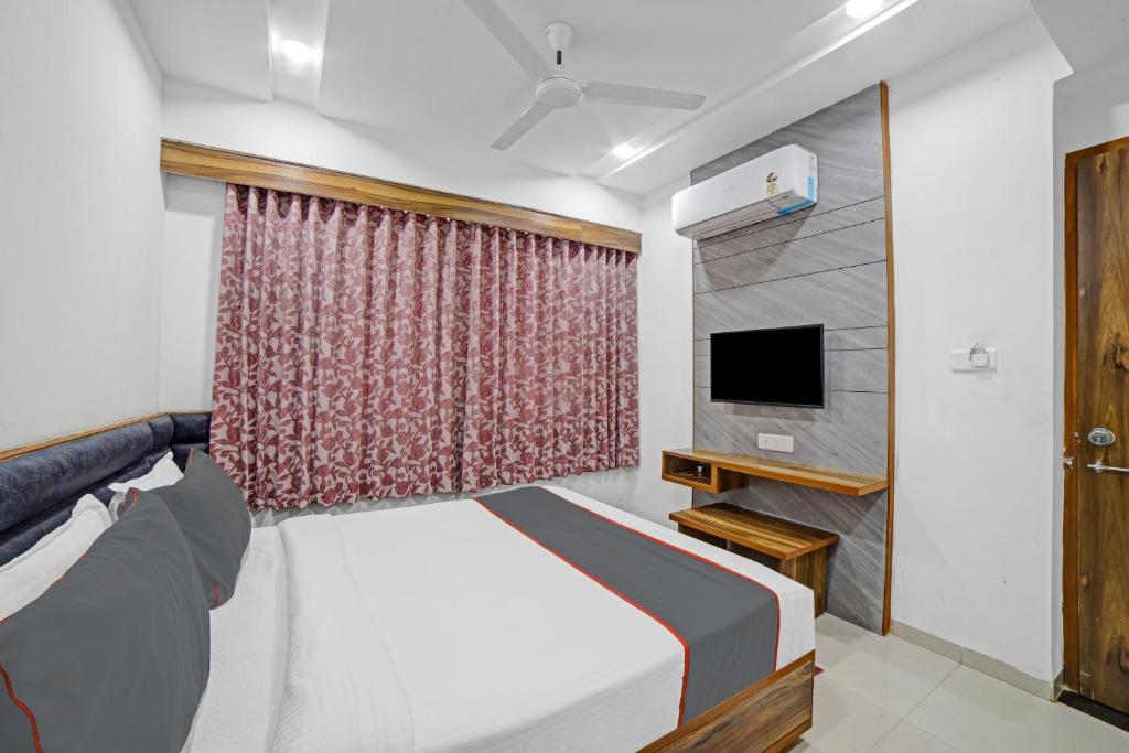 TV a/nebo společenská místnost v ubytování HOTEL TAPOVAN IN