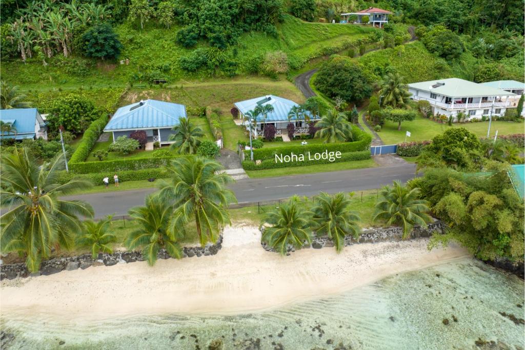 an aerial view of the main lodge at the beach at Noha Lodge in Tohautu