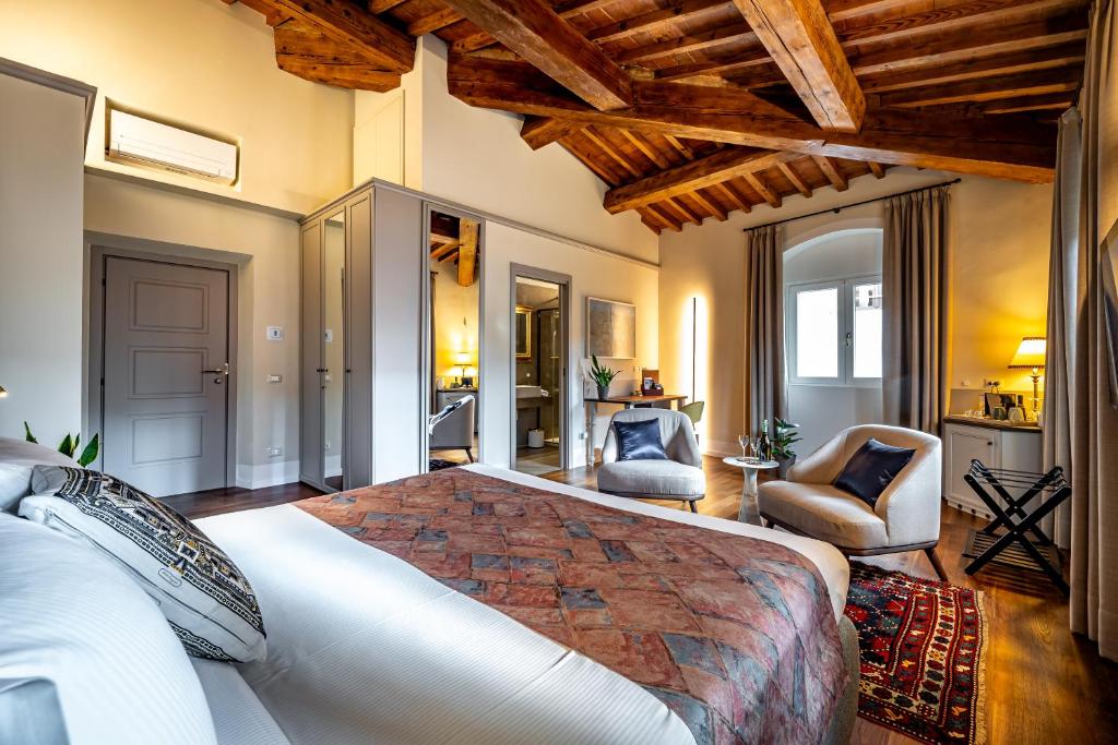 Voodi või voodid majutusasutuse Dimora Collection - Le Torri - Boutique Luxury Suites - Adults Only toas