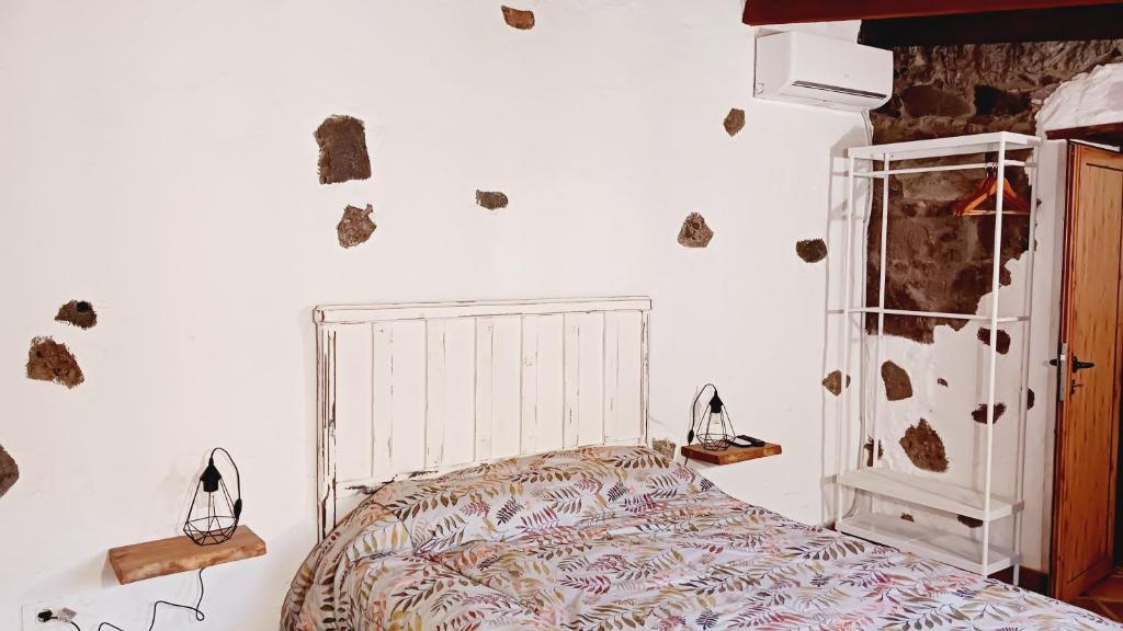 Postel nebo postele na pokoji v ubytování Casita el Parral
