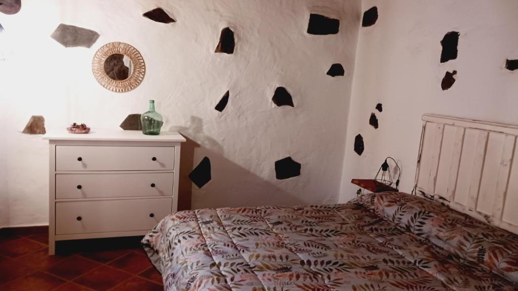 Postel nebo postele na pokoji v ubytování Casita el Parral