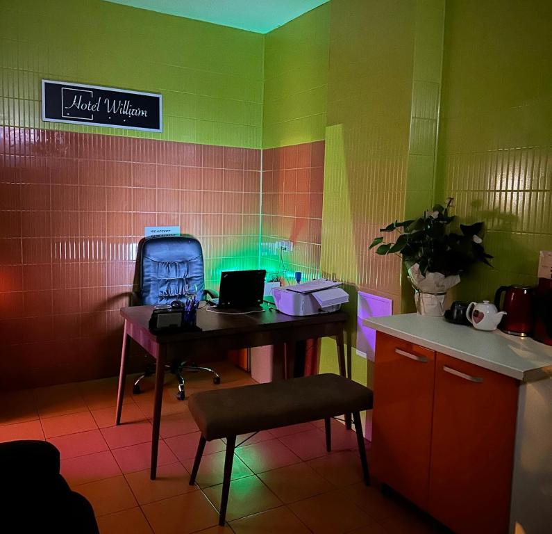 TV a/nebo společenská místnost v ubytování Hotel ENZO