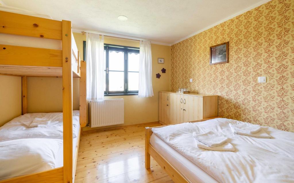 Postel nebo postele na pokoji v ubytování Hostel Gabronka