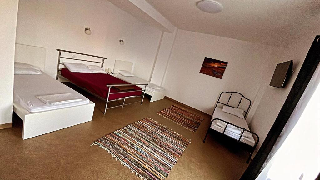 Postel nebo postele na pokoji v ubytování Hotel ENZO