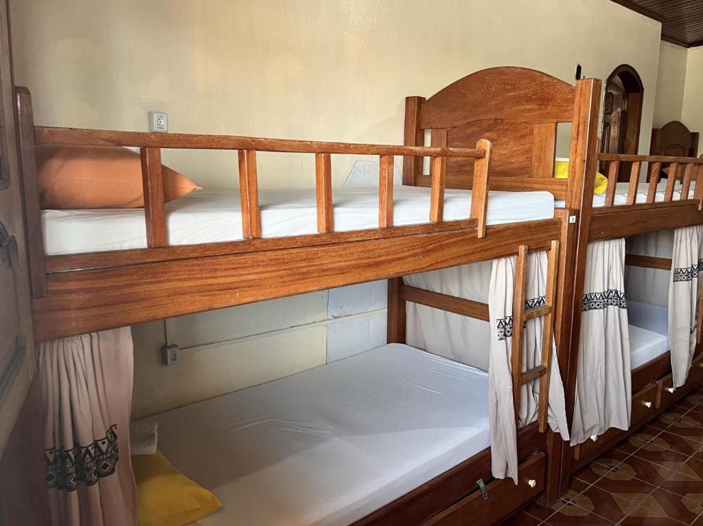 Postel nebo postele na pokoji v ubytování Hostel Roraima
