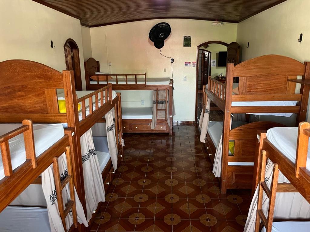 Postel nebo postele na pokoji v ubytování Hostel Roraima