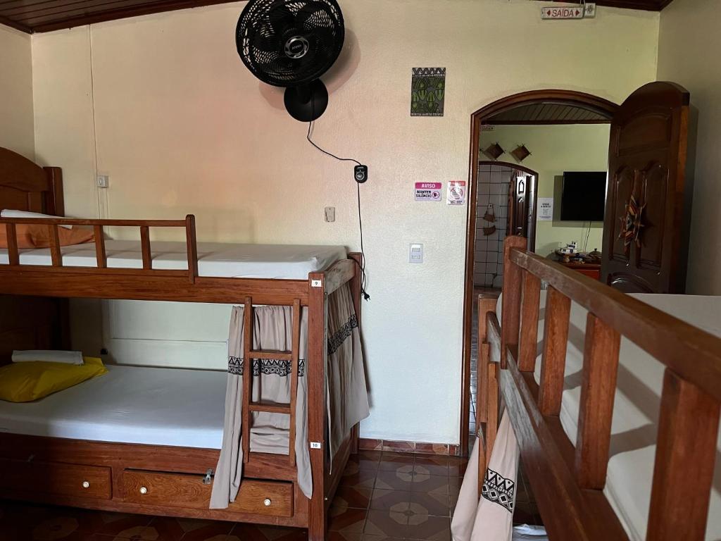 Postel nebo postele na pokoji v ubytování Hostel Roraima