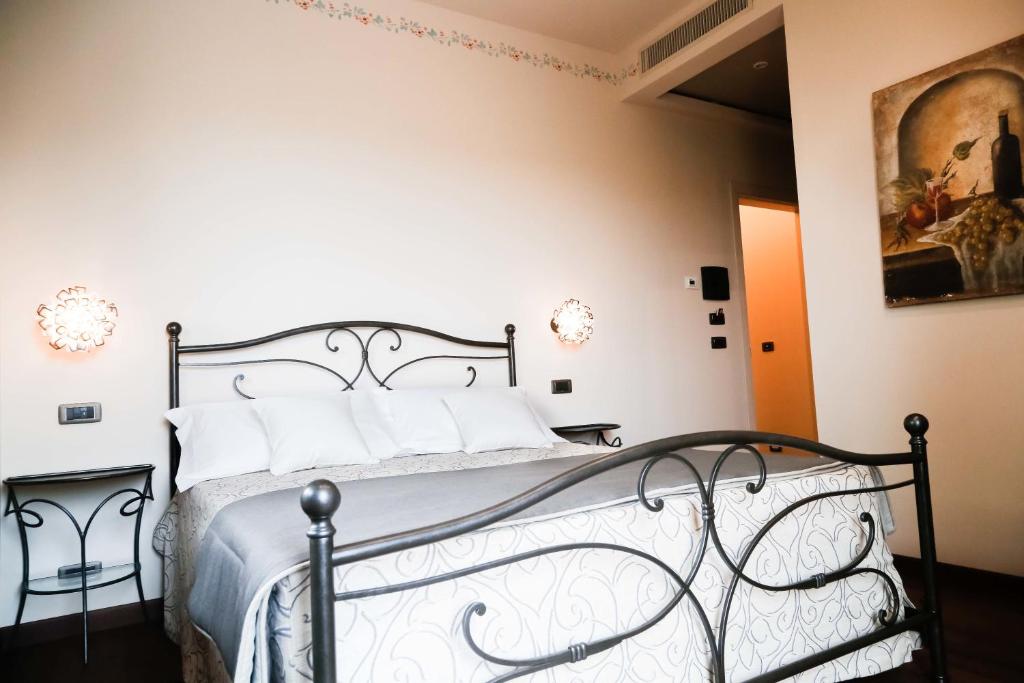 Łóżko lub łóżka w pokoju w obiekcie Cascina Cortine