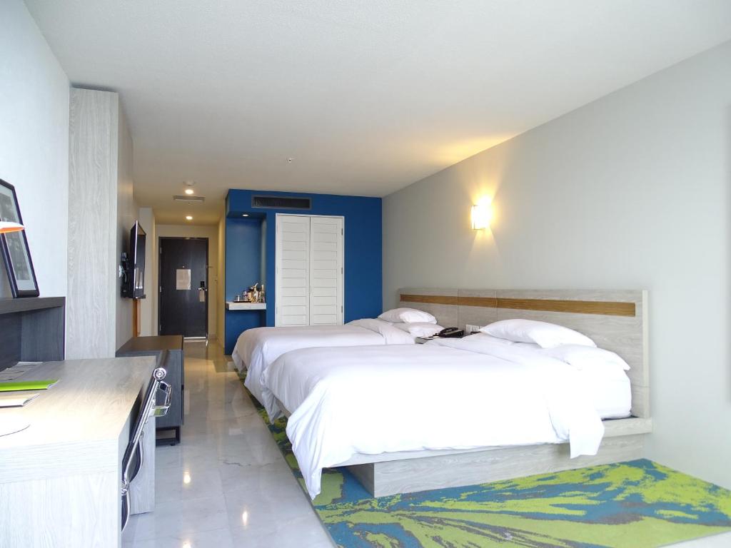 Postel nebo postele na pokoji v ubytování DoubleTree by Hilton Veracruz