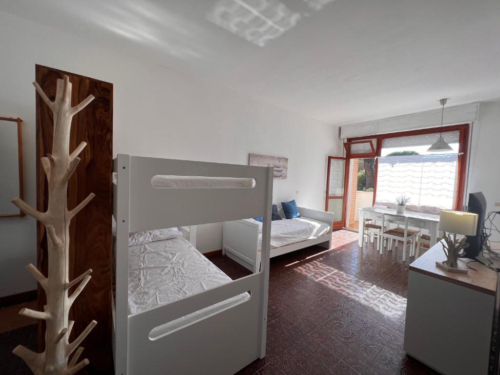 Postel nebo postele na pokoji v ubytování Residence Casa Pineta