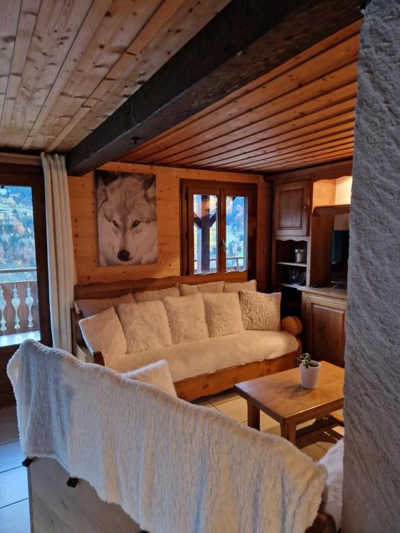 Posezení v ubytování Chalet de Manigod