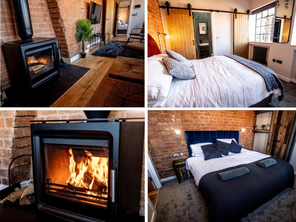 a room with a fireplace and a bedroom and a bed at VIP 3BR Grade2 Luxurious Industrial House with WOOD FIRE, Electric blinds and big Cast iron Windows in the heart of the JQ in Birmingham