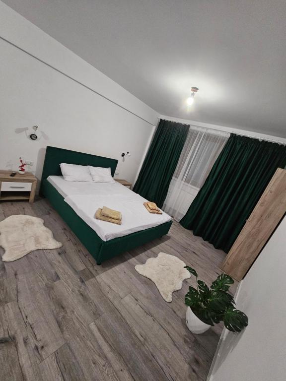 Postel nebo postele na pokoji v ubytování DIDI Apartament