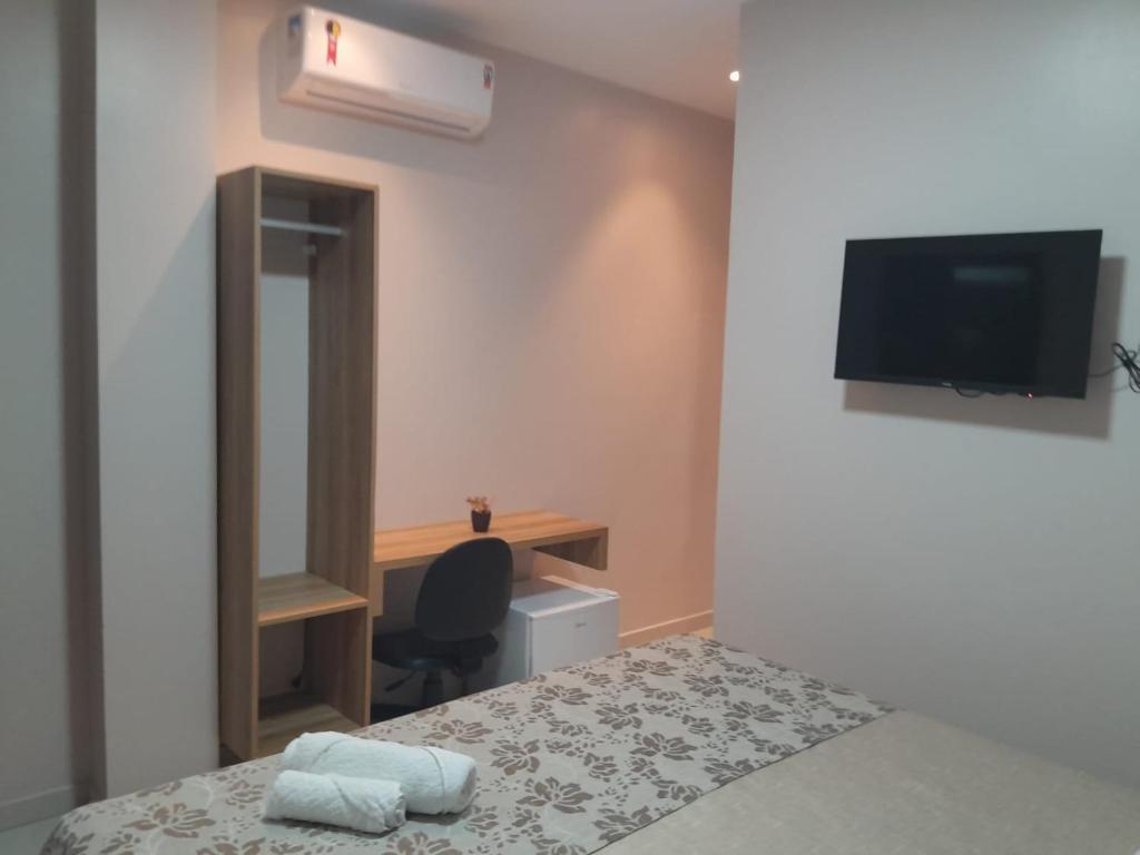 Postel nebo postele na pokoji v ubytování LC Palace Hotel