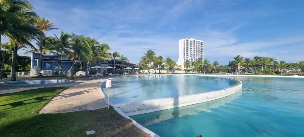 Bazén v ubytování Estudio con vista al jardìn en Town Center Playa Blanca Panama nebo v jeho okolí