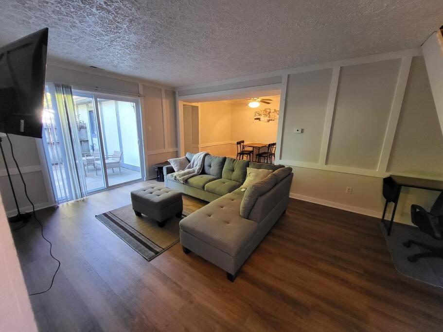 a living room with a couch and a table at Blessing Home IN in Indianapolis