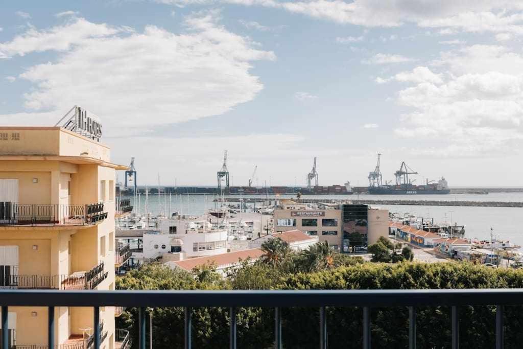 a view of a city from a balcony of a building at Frente a Puerto Azahar 3 in Grao de Castellón