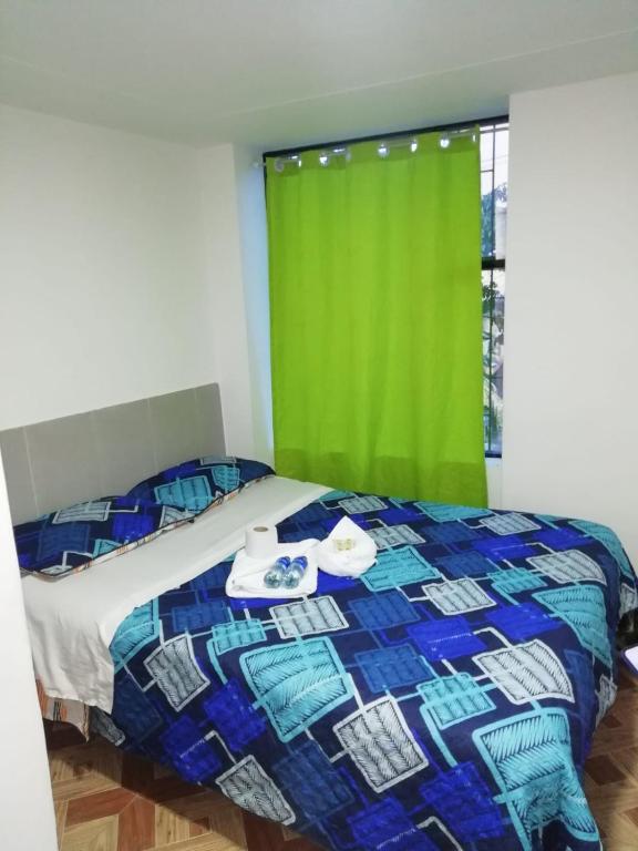 Postel nebo postele na pokoji v ubytování Hotel Villa Real