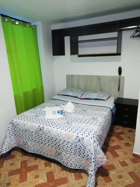 Postel nebo postele na pokoji v ubytování Hotel Villa Real