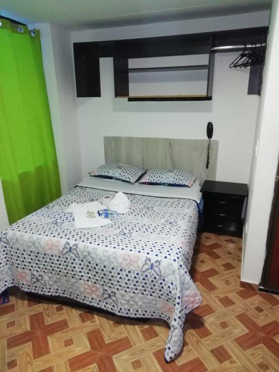 Postel nebo postele na pokoji v ubytování Hotel Villa Real